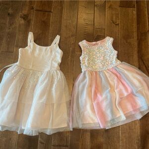 Two Cat and Jack sparkle dresses with tulle.